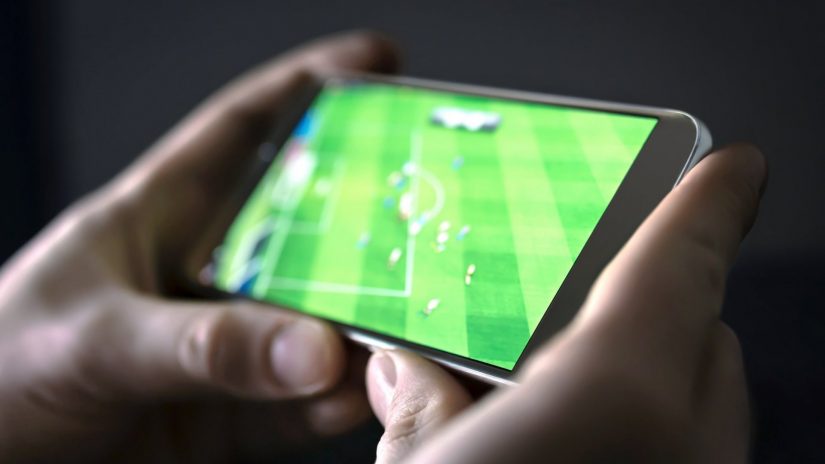 What applications help in watching football with Apple devices?